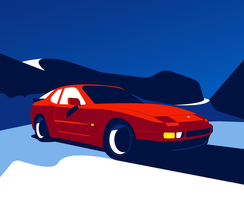 Transport yourself to a serene snowy landscape where a vintage Porsche 944 gracefully maneuvers through the winter wonderland