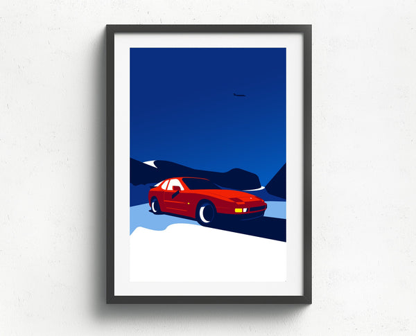 Experience the thrill of winter driving as a Porsche 944 conquers snow-covered roads in this captivating scene